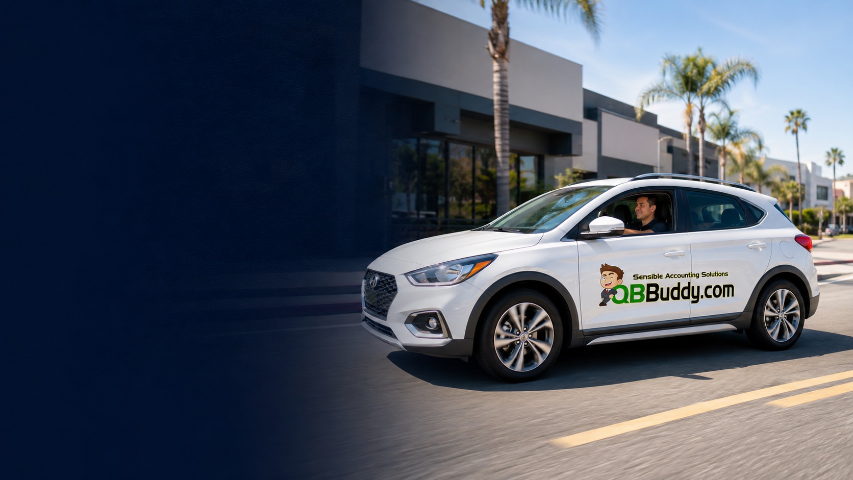 QBBuddy representative driving a branded service vehicle to provide on-site business support